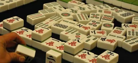 爱玩麻将挂是骗局吗（爱玩麻将的人怎么治）